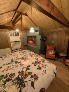 Ένα ή περισσότερα κρεβάτια σε δωμάτιο στο De oude walnoot