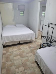 Giường trong phòng chung tại Lofts Colina