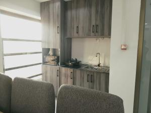 Kuchyň nebo kuchyňský kout v ubytování Studio Apartment