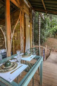 Un jardín fuera de Quinta do Vale: Casa da Árvore - em meio à mata, cascata, lago, piscina, caiaque