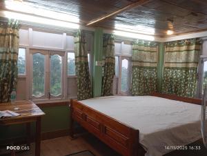 Ένα ή περισσότερα κρεβάτια σε δωμάτιο στο Nili farmhouse