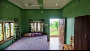 Ένα ή περισσότερα κρεβάτια σε δωμάτιο στο Nili farmhouse