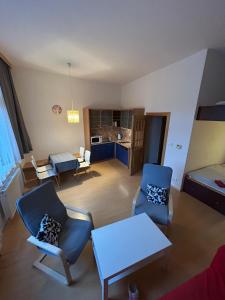 Posezení v ubytování Apartment Anna Harrachov central