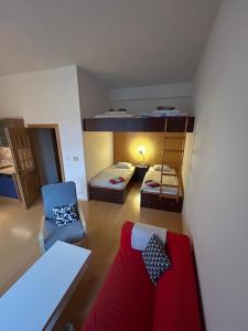 Postel nebo postele na pokoji v ubytování Apartment Anna Harrachov central