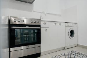 Kuchyň nebo kuchyňský kout v ubytování Danai