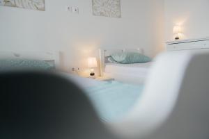 Postel nebo postele na pokoji v ubytování Danai + 15 fotografií