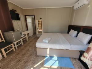 Ένα ή περισσότερα κρεβάτια σε δωμάτιο στο Bel Canto Lodge