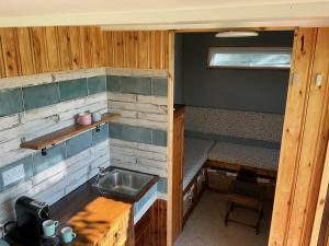 Köök või kööginurk majutusasutuses The Cosy Nest Hut