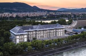 an aerial view of a building in a city at Ensana Grand Margaret Island in Budapest