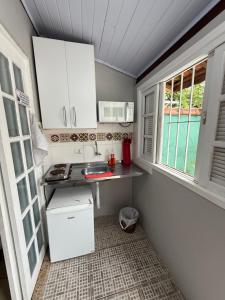 Kuchyň nebo kuchyňský kout v ubytování Bertioga litoral + 14 fotografií