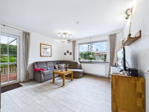 TV a/nebo společenská místnost v ubytování Nordseescholle