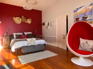 Voodi või voodid majutusasutuse Le Relais d'Angély toas