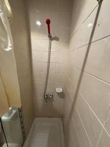 Ένα μπάνιο στο فندق ضيوف المقام الذهبي توصيل مجاني للحرم - Diouf Al Maqam Al Dahabi Hotel Free Shuttle Service to Haram