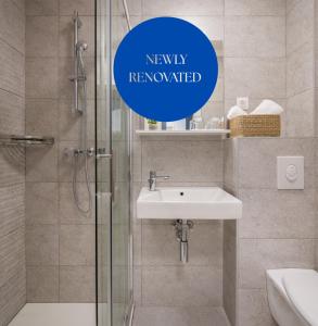 a bathroom with a shower and a sink at Hotel Alemaris in Baška Voda +35 photos