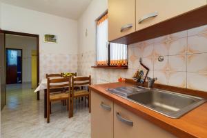 Kuchyň nebo kuchyňský kout v ubytování Apartment Sankovic