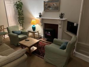 Χώρος καθιστικού στο Sandy Neuk