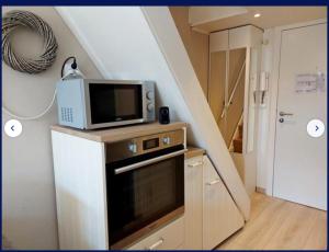 Kuchyň nebo kuchyňský kout v ubytování Duplexstudio Villa Nova + 5 fotografií