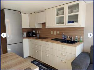 Kuchyň nebo kuchyňský kout v ubytování Duplexstudio Villa Nova