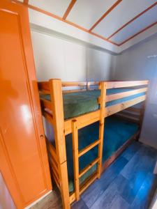 Postel nebo postele na pokoji v ubytování Domek