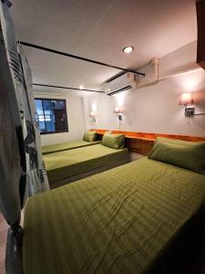 Fotografie z fotogalerie ubytování MT Friend Hostel Phuket Town v destinaci Ban Lo Long + 19 fotografií