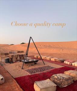 a sign that reads choose a quality camp in the desert at Best Luxury Camp in Merzouga
