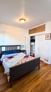 a bedroom with a large bed in a room at Comfortable residence in Everett in Everett