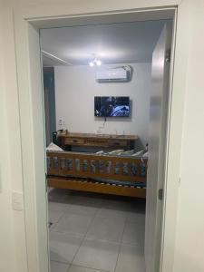 TV a/nebo společenská místnost v ubytování Apartamento Itapoá + 4 fotografie
