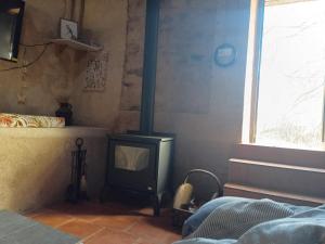 Ένα ή περισσότερα κρεβάτια σε δωμάτιο στο Molino de Tábara