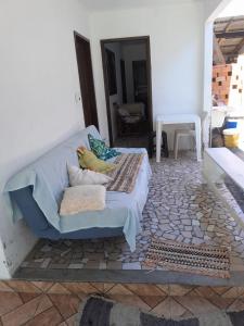 Postel nebo postele na pokoji v ubytování Quarto na praia banheiro compartilhado