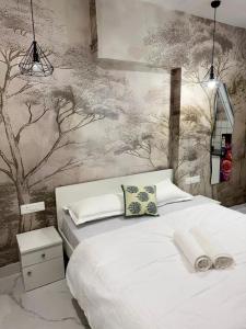 Ένα ή περισσότερα κρεβάτια σε δωμάτιο στο Private Studio Apartments by Abhibha Stays in Central Koregaon Park +89 φωτογραφίες