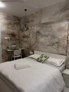 Ένα ή περισσότερα κρεβάτια σε δωμάτιο στο Private Studio Apartments by Abhibha Stays in Central Koregaon Park