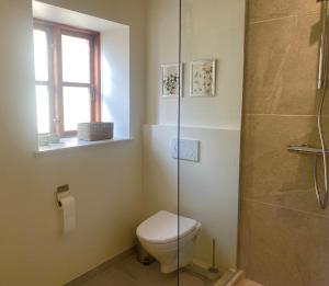 Koupelna v ubytování Riberdyb + 15 fotografií