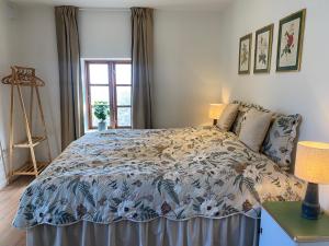 Postel nebo postele na pokoji v ubytování Riberdyb