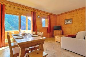 Μια τηλεόραση ή/και κέντρο ψυχαγωγίας στο Borselier vue Montagne, Spa & Terrasse