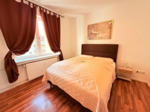 Postel nebo postele na pokoji v ubytování Wohnungen am Hagener Hbf