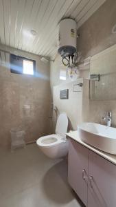 Koupelna v ubytování त्रिnity homestay