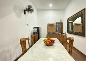 Η κουζίνα ή μικρή κουζίνα στο Daffodil House Proper Guest House Near Malioboro