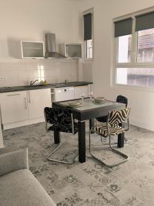 Kuchyň nebo kuchyňský kout v ubytování Villa Meyer Demeure Remarquable chambre d'hôtes standing indépendante