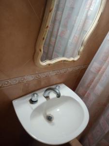 Koupelna v ubytování Casa a media cuadra del mar