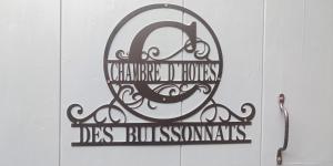 a sign for a building with a letter c on it at La Chambre des Buissonnats in Martailly-lès-Brancion