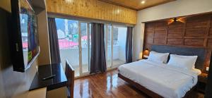 Ένα ή περισσότερα κρεβάτια σε δωμάτιο στο Lake Avenue