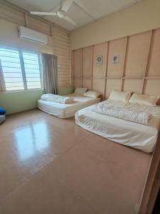 Ένα ή περισσότερα κρεβάτια σε δωμάτιο στο Grandpa House 爷爷老家