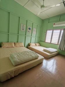 Ένα ή περισσότερα κρεβάτια σε δωμάτιο στο Grandpa House 爷爷老家