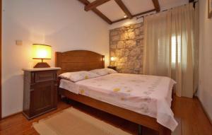 Postel nebo postele na pokoji v ubytování Apartman Tantini by Villas Guide