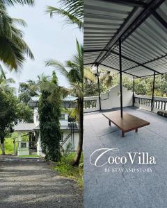 una mesa de picnic en un patio con una palmera en Coco villa, en Pālghar