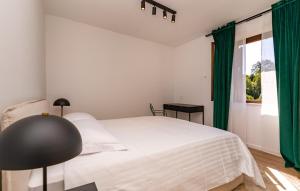 Postel nebo postele na pokoji v ubytování Villa Trojanovic by Villas Guide