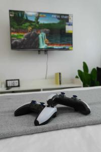 Μια τηλεόραση ή/και κέντρο ψυχαγωγίας στο Unwind Elevé +20 φωτογραφίες