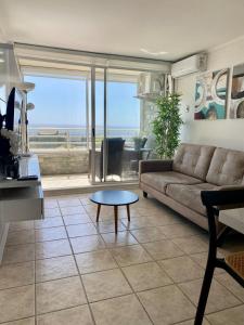 Χώρος καθιστικού στο Departamento Playa Cochoa, Reñaca