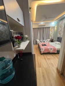 Voodi või voodid majutusasutuse Gold stay toas