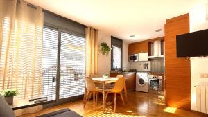 Kuchyň nebo kuchyňský kout v ubytování Acogedor apartamento by Prestigi